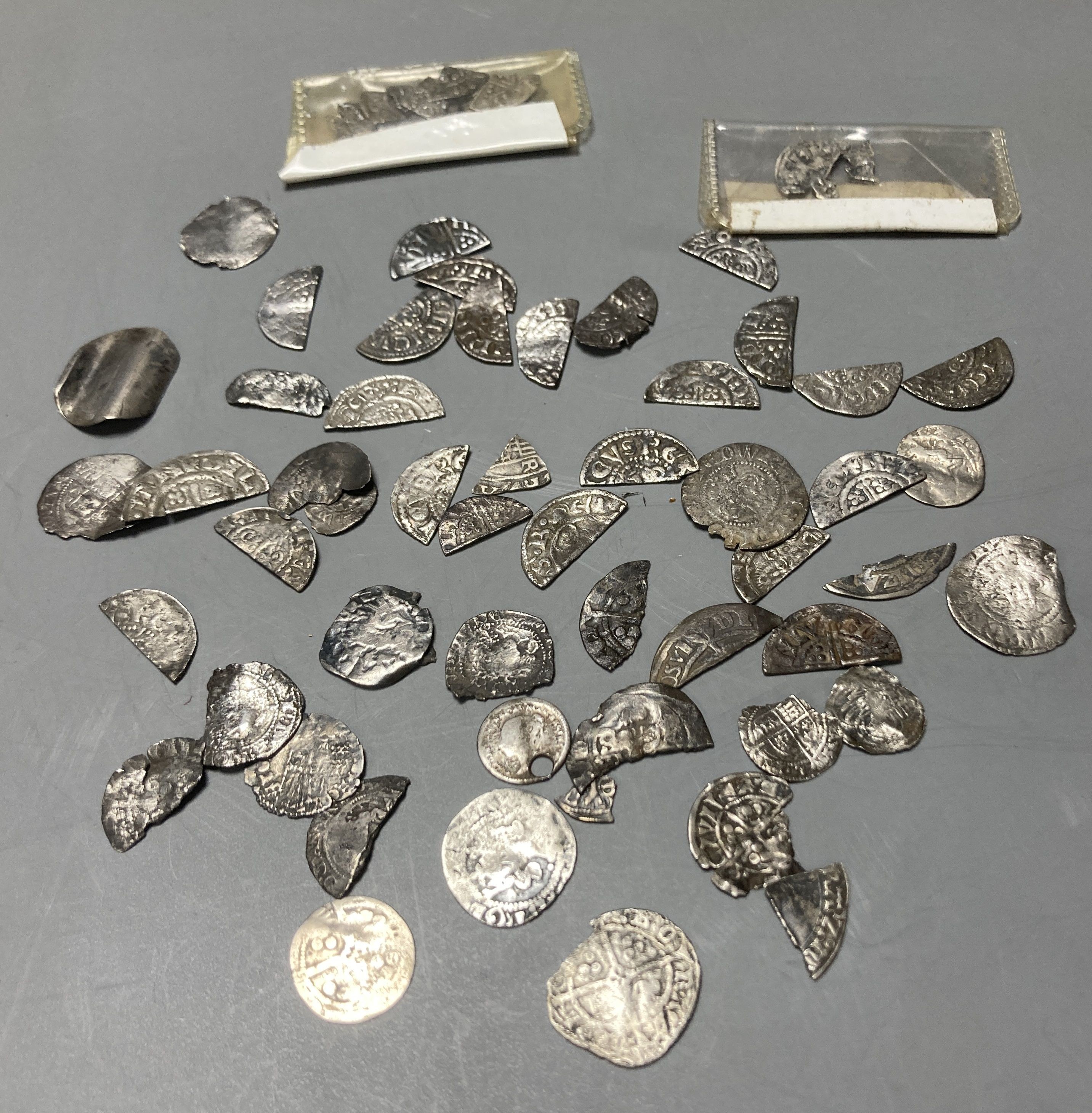 Medieval to Tudor hammered coinage - a collection of cut half and quarter short and long cross pennies and other fragments